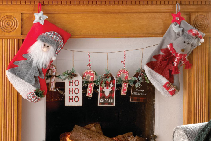 Stockings hanging above a fireplace