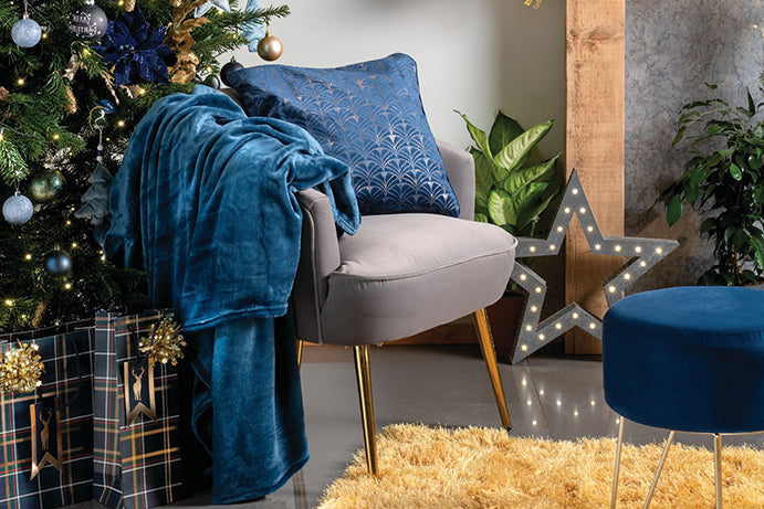 Midnight blue and gold living room at Christmas time