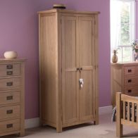 See more information about the Cotswold Oak Tall Wardrobe Natural 2 Doors 